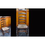 American, Wooden, Early 19th Century Ladderback Armless Rocking Chair with Woven Rush Seat. In