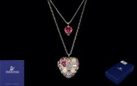 Swarovski Statement Crystal Set Heart Locket Boxed and certificated silver tone locket on long