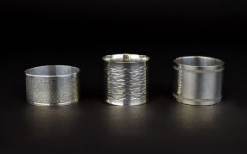 A Small Collection of Vintage Silver Napkin Holders, Various Designs and Makers.