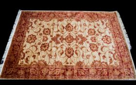 A Very Large Woven Silk Carpet Large Zeigler carpet, red ground with repeated red floral and foliate