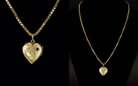 Heart Shaped 9ct Gold Pendant / Locket Inset with a Single Sapphire and Attached to a 9ct Gold Box