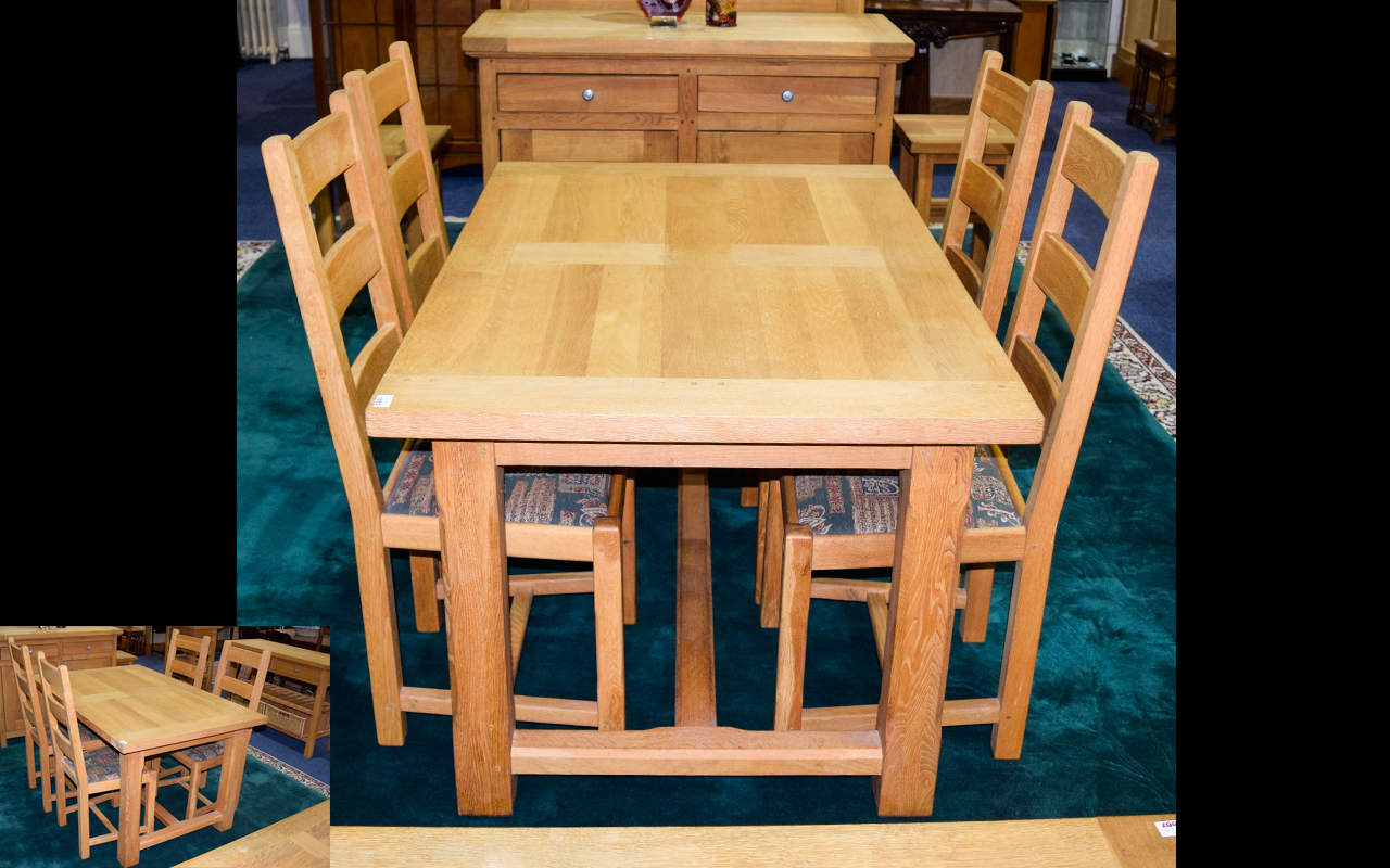 A Solid Oak Dining Suite Contemporary dining suite comprising extending table and four chairs of