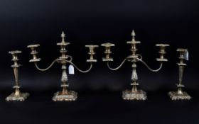 Pair Of Silver Plated Three Branch Candelabra's Together With A Matching Pair Of Candle Sticks