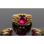 18ct Gold Set Single Stone Ruby Ring. In a Gypsy Setting. The Ruby of Excellent Pigeon Blood Colour.