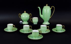 Lime Green Part Coffee Set comprising coffee pot, 5 cups and saucers and two handled sugar bowl.