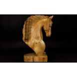 A Decorative Carved Wooden Horse Head Grecian Style carved horse head on wooden plinth with
