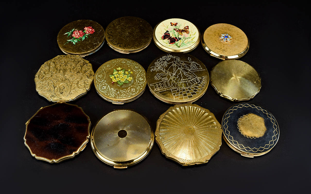 A Large Collection Of Vintage Stratton Compacts Twelve in total to include several gold tone