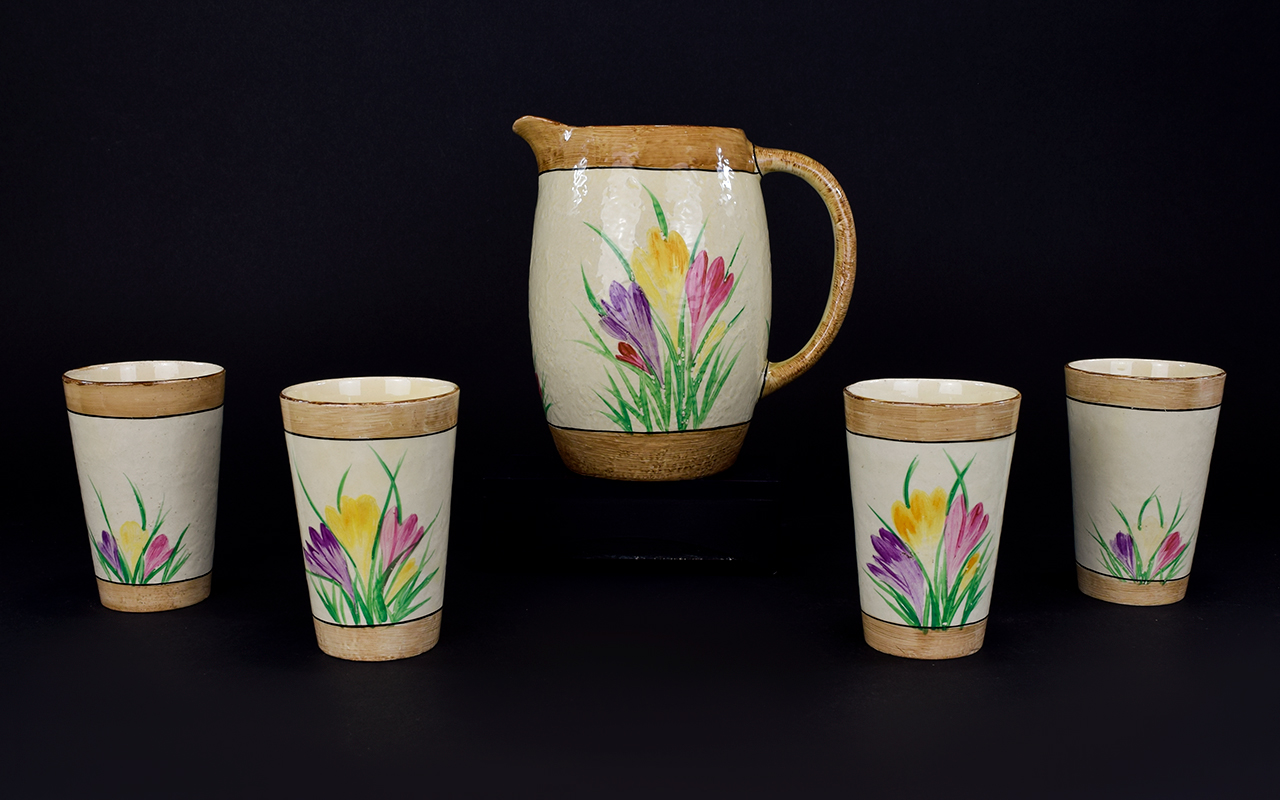 Royal Ivory John Maddock & Sons ''Sunset Ware'' Lemonade Jug and Four beakers. 7 inches in height.