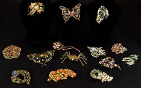 A Large Collection Of Vintage Costume Jewellery Brooches Fourteen items in total to include gold