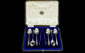 George V Set of Silver Teaspoons and Matching Sugar Tongs.