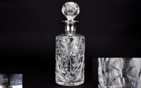 Edwardian Silver Collared Cut Crystal Decanter.