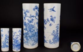 Chinese 19th Century Pair of Cylindrical Shaped Blue and White Vases, Decorated with Images of
