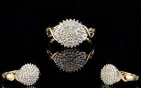 Ladies 9ct Gold Diamond Set Cluster Ring. Flowerhead Setting, with X Designed Shoulders.