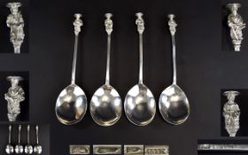 18th Century Matched Set of Four Silver Spoons with Later Attached White Metal Figural Finials.