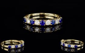 Ladies 14ct Gold Channel Set Sapphire and Diamond Dress Ring, Set with 5 Sapphires and 4 Diamond