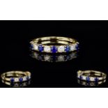 Ladies 14ct Gold Channel Set Sapphire and Diamond Dress Ring, Set with 5 Sapphires and 4 Diamond