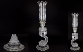 A Signed Baccarat Glass Dolphin Form Candlestick 20th century French glass candle stick, the