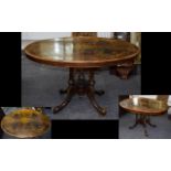 Victorian Walnut Inlaid Table. Oval Tilt Top On Quatrefoil Base. 33 x 47 Inches, Height 28 Inches