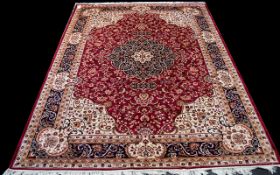 A Large Woven Silk Carpet Keshan rug with beige ground and traditional Middle Eastern floral and