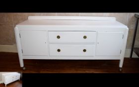 White Painted Wood Sideboard with two long drawers to centre and cupboard space to either side. 64