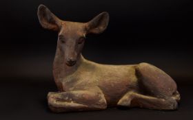 A Resin Figure In The Form Of Fawn Bronzed effect figure for garden or indoor use in the form of