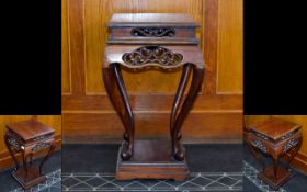 An Oriental Occasional Table/Jardiniere Dark wood table with suare top and square base, queen Anne