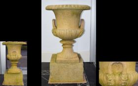 Antique Garden Urn A very large decorative stone urn mounted on square stone base, with reeded