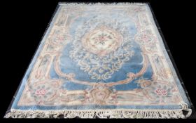 A Large Oriental Pattern Rug Duck egg blue ground with repeated oriental floral and foliate motif in