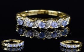Ladies 9ct Gold Amethyst and Diamond Channel Set Ring.