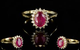 Ladies 9ct Gold Set Ruby and Diamond Cluster Ring, With Flower head Setting.