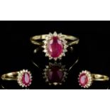 Ladies 9ct Gold Set Ruby and Diamond Cluster Ring, With Flower head Setting.