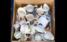 A Varied Collection Of Decorative Ceramic Jugs Over twelve items in total to include, Royal