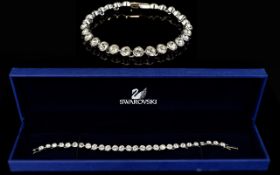Swarovski Crystal Boxed Tennis Bracelet Brand new 28 station silver tone elegant bracelet set with