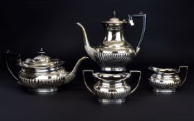Antique Period 4 Piece Silver Plated Tea And Coffe Service with half ribbed bodies.