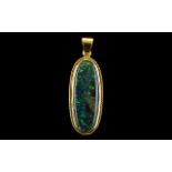 Large Black Opal Pendant Set In An 18ct Gold Mount With Rope Twist Border,