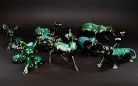 A Collection Of Green/Black Blue Mountain Ceramic Figures comprising of five wildlife animals,