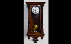 Vienna Wall Clock of typical form, white enamel dial, Roman Numerals, spring driven movement with