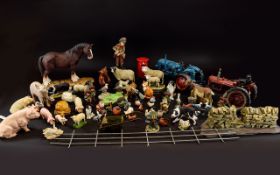 A Large Collection Of Farm Yard Animals And Accessories comprising of a Power Fordson Major tractor,
