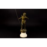 Reproduction Spelter Figure In The Form Of A Classical Putto Cast metal figure on turned base in the