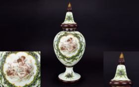 Victorian Period Handpainted and Enamel Opaline Glass Urn Shaped Lidded Vase. Circa 1880's. The