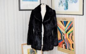 A Ladies Vintage Rabbit Fur Jacket Black Coney jacket with concealed hook and eye closure, revere