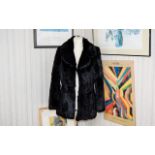 A Ladies Vintage Rabbit Fur Jacket Black Coney jacket with concealed hook and eye closure, revere