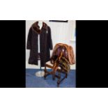 Astra Fur Full Length Vintage Coat with hook and eye fastening and slit pockets,