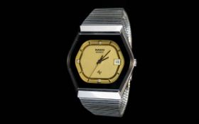 Rado Quartz Wristwatch with hexagonal face, stainless steel watch and gold dial.