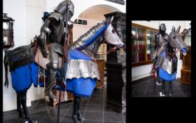 A Lifesize Horse With Medieval Jousting Knight Large black stallion fashioned from fibreglass with