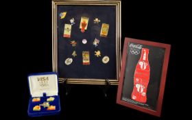 Olympic Interest A Varied Collection Of Enamel Pin Badges Three items in total to include rare,