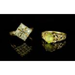 14ct Yellow Gold Single Stone Peridot (Pale Green) Set Dress Ring. with reticulated shoulders.