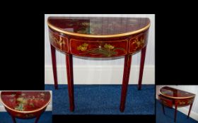 A Decorative Chinese Console Table Crescent form table with central front drawer,