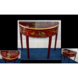 A Decorative Chinese Console Table Crescent form table with central front drawer,