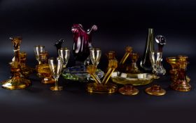 A Collection Of Vintage Amber Glass Items Twenty six items in total to include several candlesticks,
